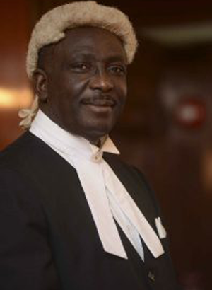 The Hon. Mr. Justice K. Neville Adderley