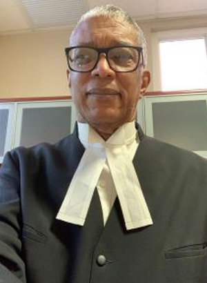 The Hon. Mr. Justice Stanley John